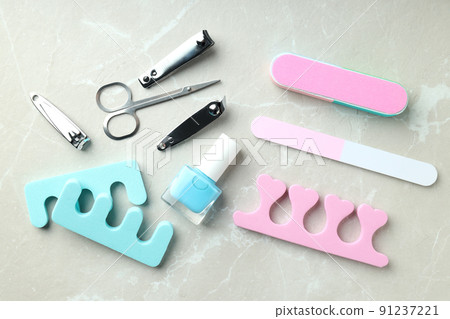 Concept of nail care with manicure accessories on light textured background 91237221