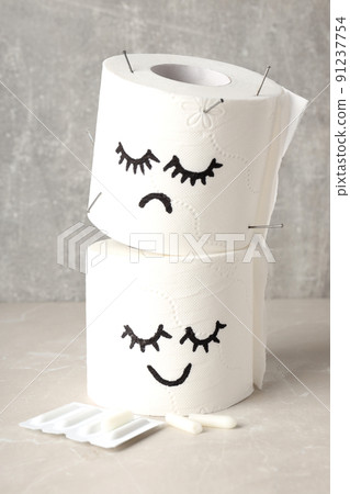 Concept of healthcare with hemorrhoids accessories on light textured table 91237754