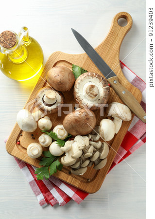 Concept of cooking with mushroom on white wooden 91239403