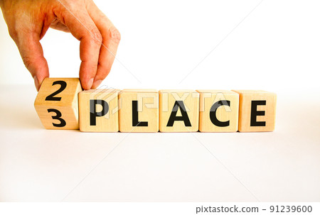 From 3 to 2 place symbol. Businessman turns wooden cubes and changes concept words 3 place to 2 place. Beautiful white table white background. Business and from 3 to 2 place concept. Copy space. From 3 to 2 place symbol. Businessman turns wooden cubes and changes concept words 3 place to 2 place. Beautiful white table white background. Business and from 3 to 2 place concept. Copy space. 91239600