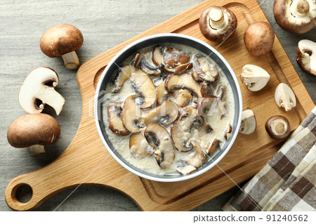 Concept of tasty food with mushroom sauce on gray wooden background 91240562