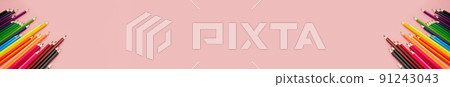 banner two group of multicolored watercolor pencils on pink background 91243043