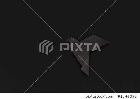 black paper origami pigeon on black background, minimalism black paper origami pigeon on black background, minimalism 91243053