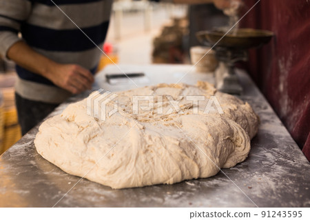 mass of yeast dough in the bakery 91243595