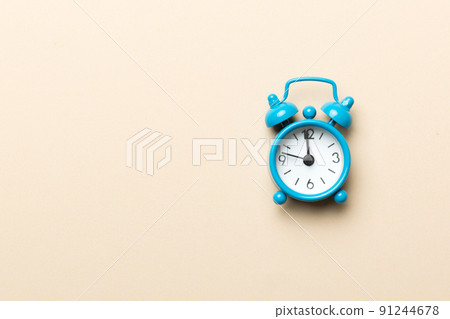 Alarm clock isolated on colored background with copy space top view Alarm clock isolated on colored background with copy space top view 91244678