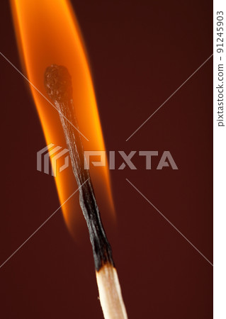 burning match closeup 91245903