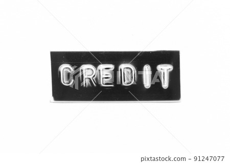 Black color banner that have embossed letter with word credit on white paper background 91247077