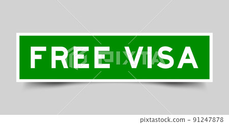 Sticker label with word free visa in green color on gray background 91247878