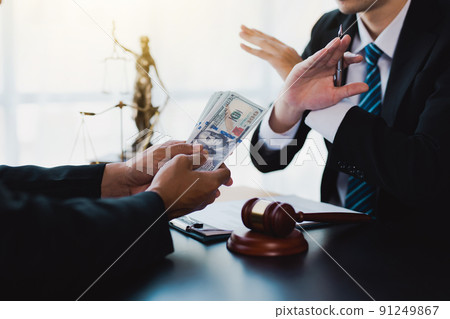 Businessmen or politicians refuse to accept bribes that are given in envelopes. To do illegal business, corruption in the contracting business, corruption concept and bribery. Businessmen or politicians refuse to accept bribes that are given in envelopes. To do illegal business, corruption in the contracting business, corruption concept and bribery. 91249867