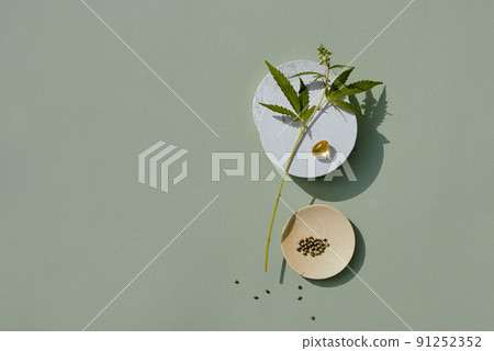 Podium and hemp leaf for the presentation of products with CBD oil and cannabis 91252352