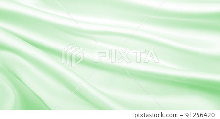 Smooth elegant green silk or satin luxury cloth texture as abstract background. Luxurious background design Smooth elegant green silk or satin luxury cloth texture as abstract background. Luxurious background design 91256420