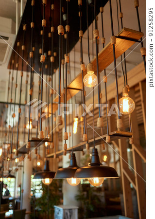 Close up many yellow lamp in cafe at night. Close up many yellow lamp in cafe at night. 91258295