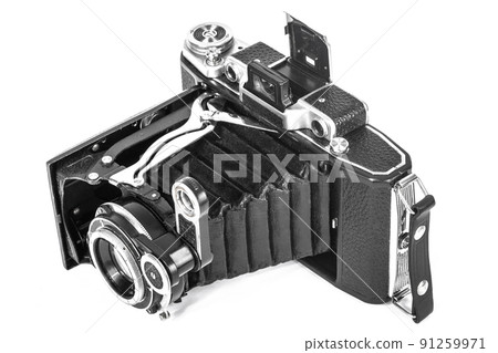film camera on a white background with an accordion lens isolate 91259971