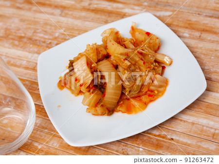 Traditional Korean Kimchi of salted fermented napa cabbage Traditional Korean Kimchi of salted fermented napa cabbage 91263472
