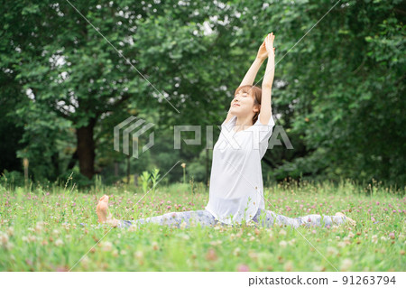 Park yoga woman 91263794