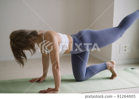 A young woman training 91264005