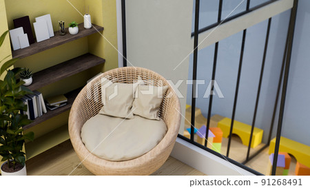 Relaxing area in living room interior design with comfortable round wicker chair 91268491