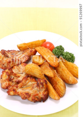 Roast chicken french fries white plate bright background 91269997