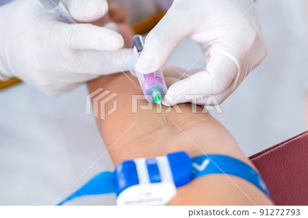 Nurse collecting a blood from patient in hospital 91272793