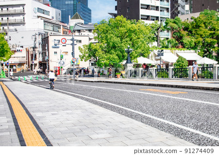 I am shooting the eastern direction from Motoyasu Bridge in the Peace Memorial Park. The Italian restaurant is on the right. Hiroshima I am shooting the eastern direction from Motoyasu Bridge in the Peace Memorial Park. The Italian restaurant is on the right. Hiroshima 91274409