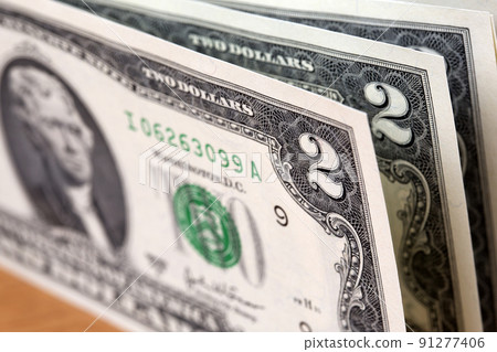 American money - 2 dollars a background American money - 2 dollars a background 91277406