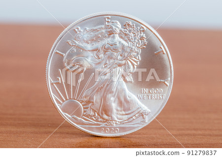 1oz fine silver one dollar (Bullion Coin). Side with Walking Liberty and United States' official motto 1oz fine silver one dollar (Bullion Coin). Side with Walking Liberty and United States' official motto 91279837