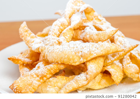 Homemade polish Angel Wings known in Poland as faworki or chrusty. Homemade polish Angel Wings known in Poland as faworki or chrusty. 91280042