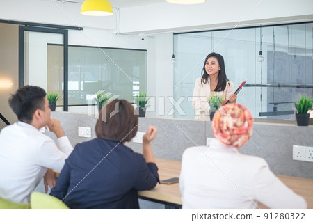 Business team training with trainer briefing participants and trainees. 91280322