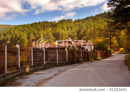 Autumn landscape with road and houses, Bulgaria 91281642