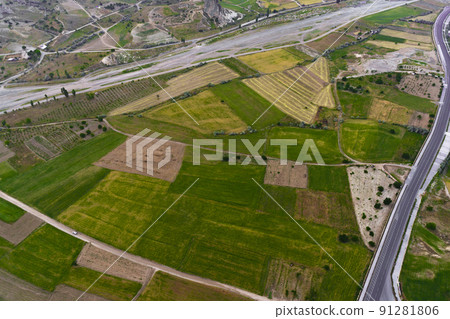 Fields in Cappadocia from a bird's-eye view. Fields in Turkey. Fields in Cappadocia from a bird's-eye view. Fields in Turkey. 91281806