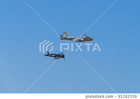 B-25J F4U-4 Corsair carrier-capable fighter escorting Mitchell bomber 91282559