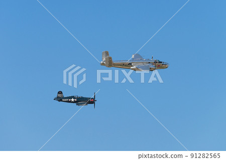 B-25J F4U-4 Corsair carrier-capable fighter escorting Mitchell bomber B-25J F4U-4 Corsair carrier-capable fighter escorting Mitchell bomber 91282565