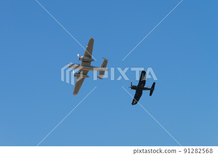 B-25J F4U-4 Corsair carrier-capable fighter escorting Mitchell bomber 91282568