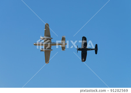 B-25J F4U-4 Corsair carrier-capable fighter escorting Mitchell bomber B-25J F4U-4 Corsair carrier-capable fighter escorting Mitchell bomber 91282569