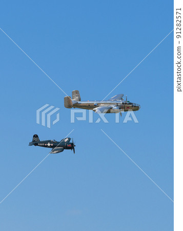 B-25J F4U-4 Corsair carrier-capable fighter escorting Mitchell bomber 91282571