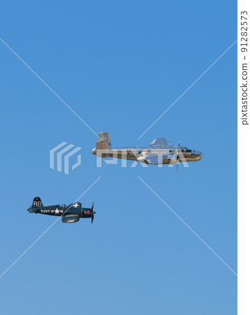 B-25J F4U-4 Corsair carrier-capable fighter escorting Mitchell bomber B-25J F4U-4 Corsair carrier-capable fighter escorting Mitchell bomber 91282573
