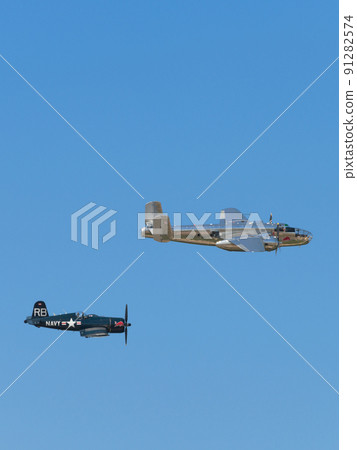 B-25J F4U-4 Corsair carrier-capable fighter escorting Mitchell bomber 91282574