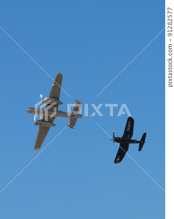 B-25J F4U-4 Corsair carrier-capable fighter escorting Mitchell bomber 91282577