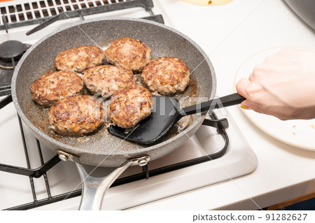 Hamburger while cooking 91282627