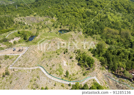 Aerial view of Toya Nishiyama foot crater (walking path and crater group) 91285136
