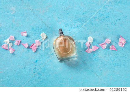 Rose fragrance essence flat lay composition, a perfume bottle Rose fragrance essence flat lay composition, a perfume bottle 91289162