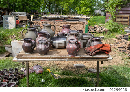 fired earthenware removed from the kiln. Mugs, pots, plates and everything else beautiful and useful. Latvian national cultural heritage 91294038