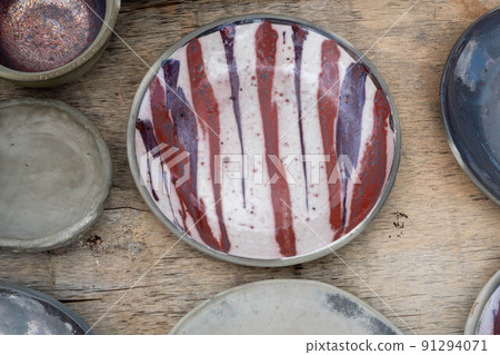 fired earthenware removed from the kiln. Mugs, pots, plates and everything else beautiful and useful. Latvian national cultural heritage fired earthenware removed from the kiln. Mugs, pots, plates and everything else beautiful and useful. Latvian national cultural heritage 91294071