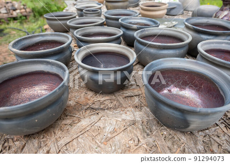 fired earthenware removed from the kiln. Mugs, pots, plates and everything else beautiful and useful. Latvian national cultural heritage fired earthenware removed from the kiln. Mugs, pots, plates and everything else beautiful and useful. Latvian national cultural heritage 91294073
