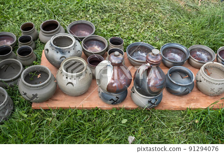fired earthenware removed from the kiln. Mugs, pots, plates and everything else beautiful and useful. Latvian national cultural heritage fired earthenware removed from the kiln. Mugs, pots, plates and everything else beautiful and useful. Latvian national cultural heritage 91294076