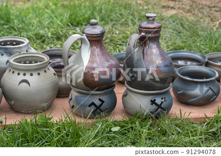 fired earthenware removed from the kiln. Mugs, pots, plates and everything else beautiful and useful. Latvian national cultural heritage fired earthenware removed from the kiln. Mugs, pots, plates and everything else beautiful and useful. Latvian national cultural heritage 91294078