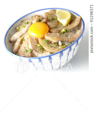 Pork toro bowl with cut lemon and egg yolk, grilled meat bowl photographed on a white background 91296371