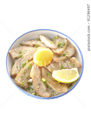 A bird's-eye view of a pork bowl with cut lemon and egg yolk and a grilled meat bowl on a white background 91296497