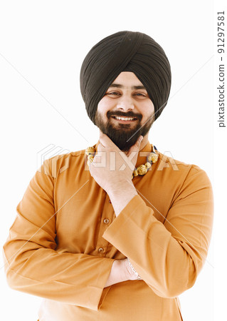 Young man posing casually over white wall. Studio, isolated. 91297581