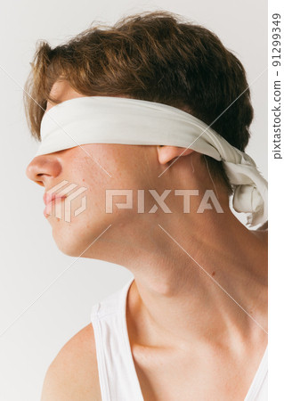 Handsome man with closed eyes isolated on white studio background. Concept of fashion, youth, emotions, facial expression, ad 91299349